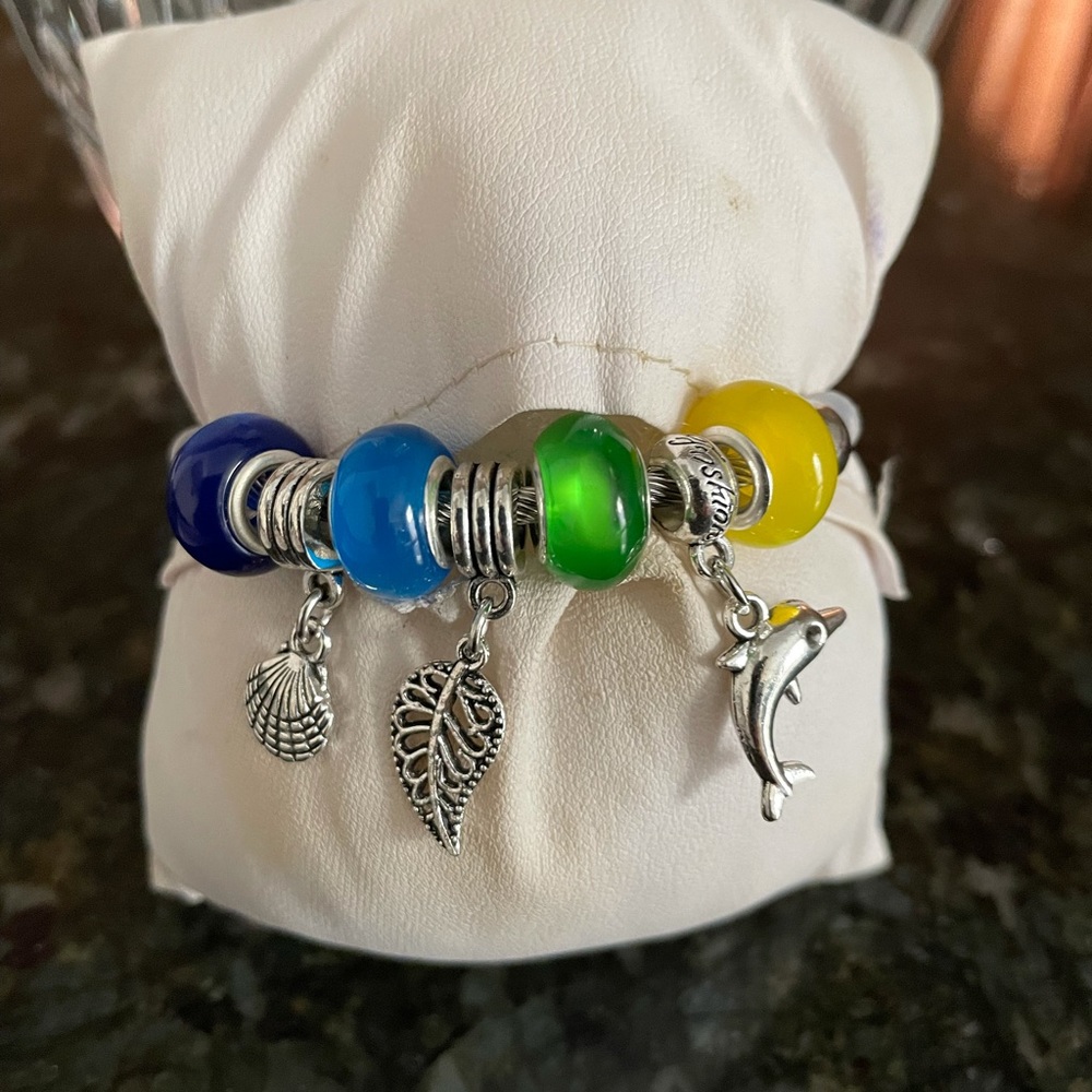 Colorful Ocean Glass Charm Bracelet with Dolphin & Leaf Charms